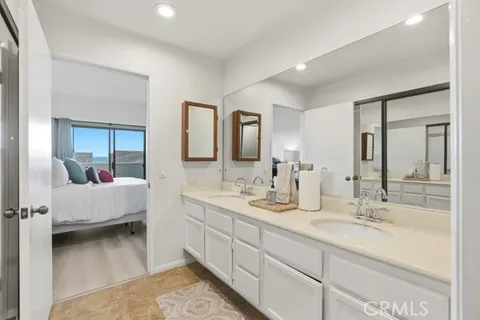 a workspace with furniture and a potted plant