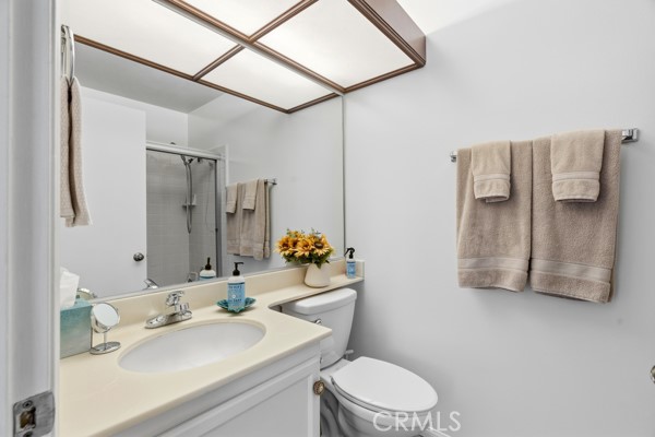 442 Walker Road San Dimas, CA 91773 - Photo 34 of 48 a bathroom with a sink vanity mirror and toilet