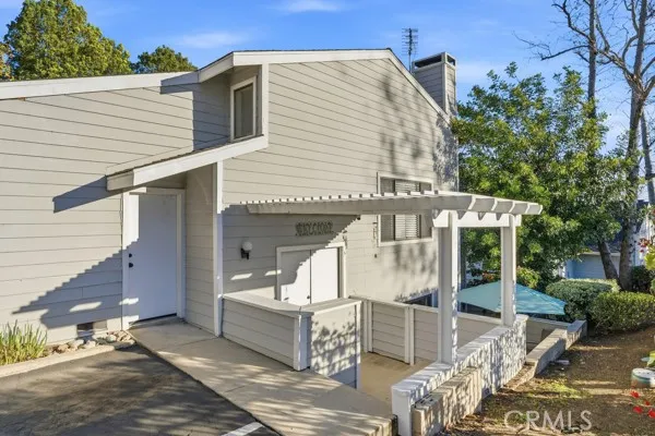 front view of a house with a patio