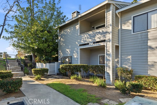 442 Walker Road San Dimas, CA 91773 - Photo 7 of 48 a front view of a house with garden