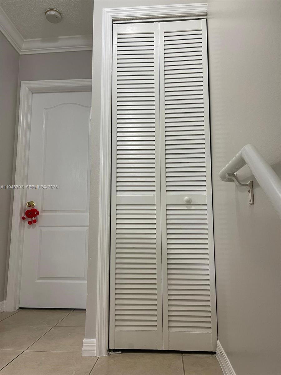 527 West 68th Street, Unit 1 Hialeah, FL 33014 - Photo 4 of 7 a view of a room with wooden floor