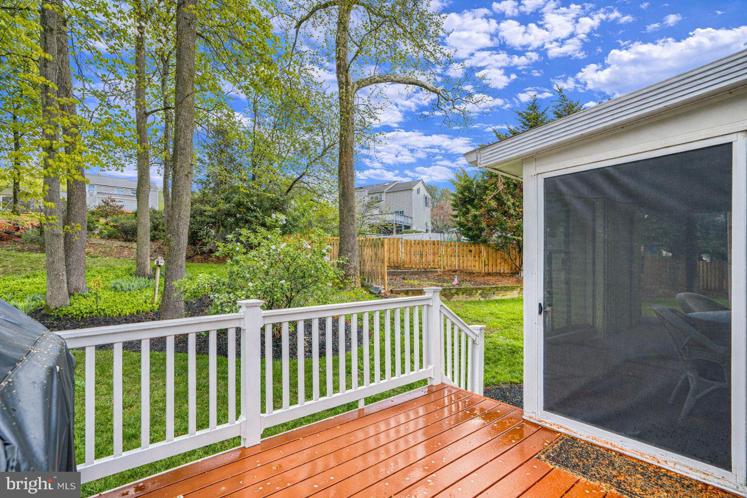 9405 Perglen Road Nottingham, MD 21236 - Photo 29 of 36 a view of a wooden deck next to a yard
