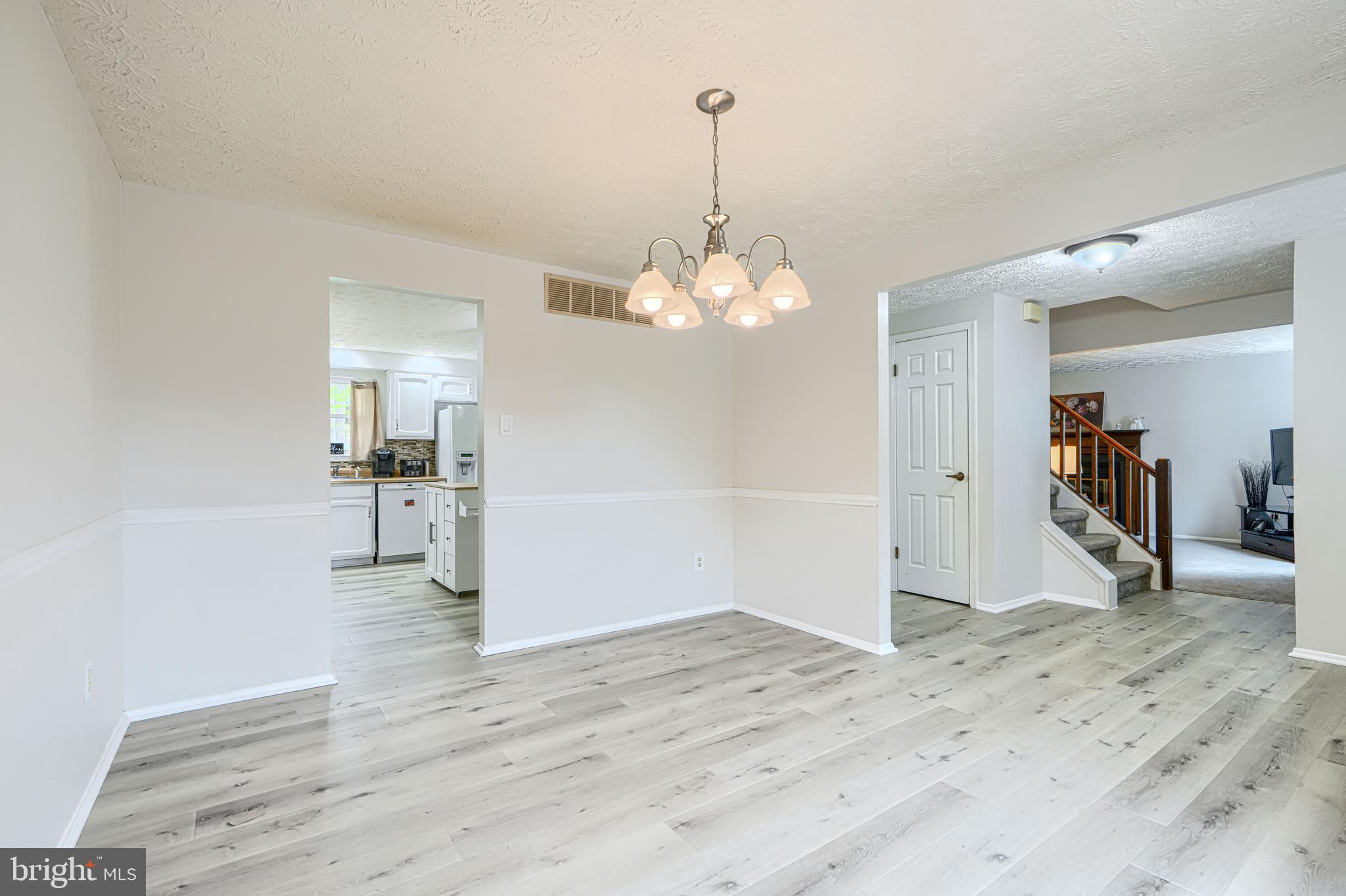 9405 Perglen Road Nottingham, MD 21236 - Photo 8 of 36 a view of a livingroom with wooden floor