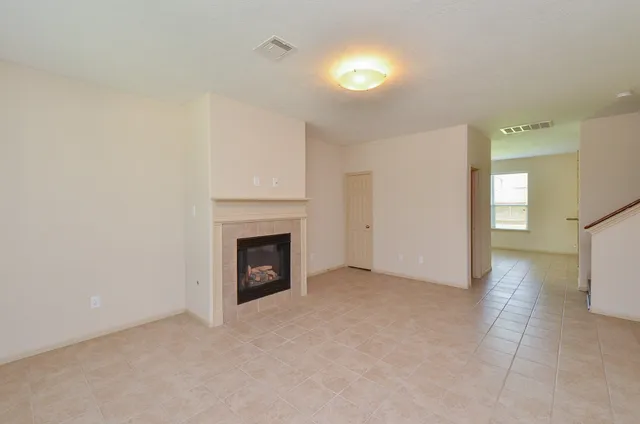 a view of a livingroom with a fireplace