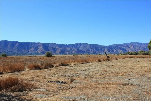 a view of barn and a yard