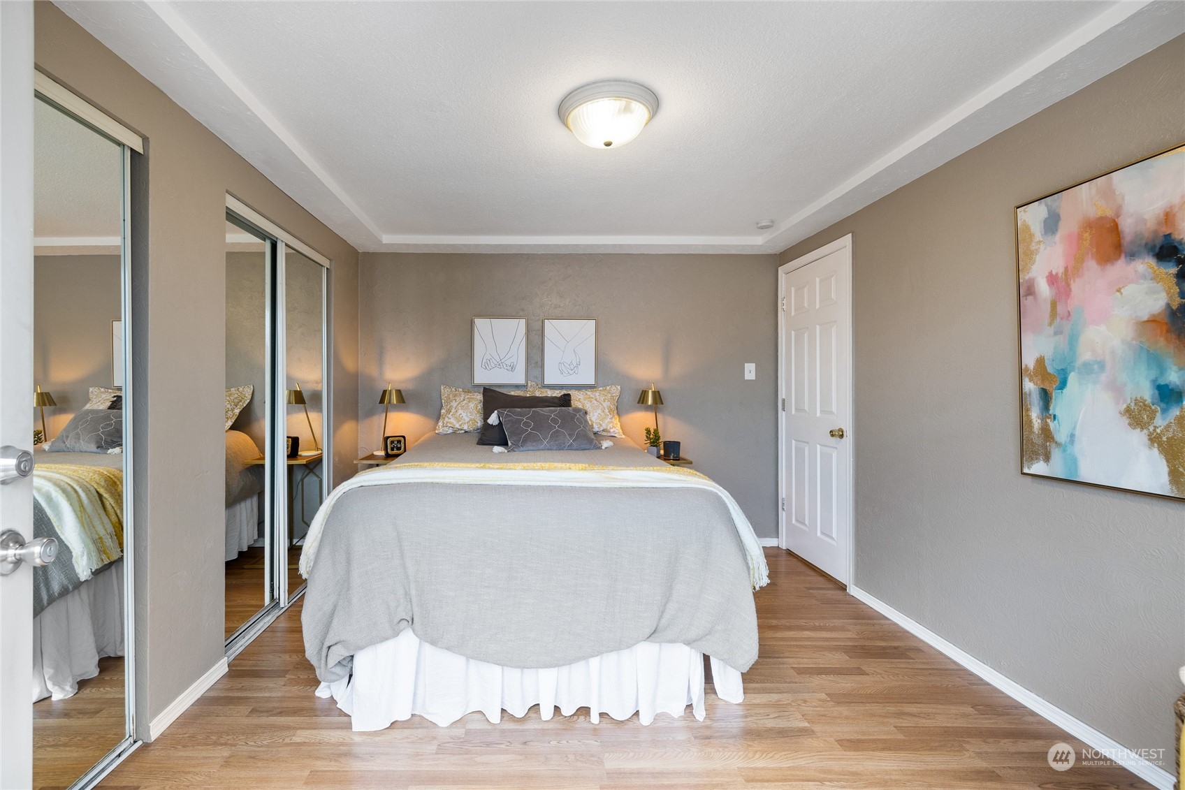 5037 South State Street Tacoma, WA 98409 - Photo 17 of 40 a bed room with a bed and a painting