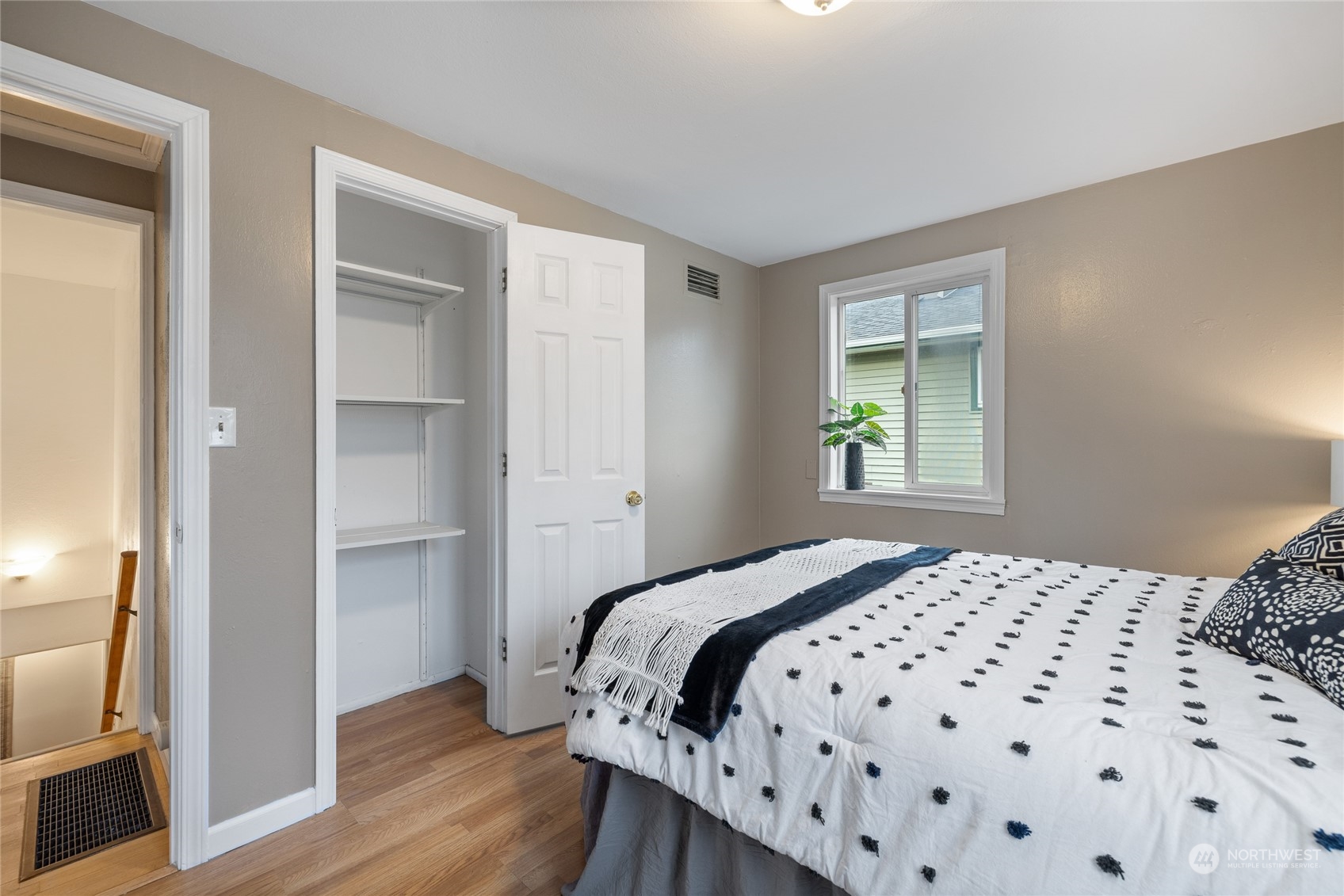 5037 South State Street Tacoma, WA 98409 - Photo 22 of 40 a bedroom with a bed and a window