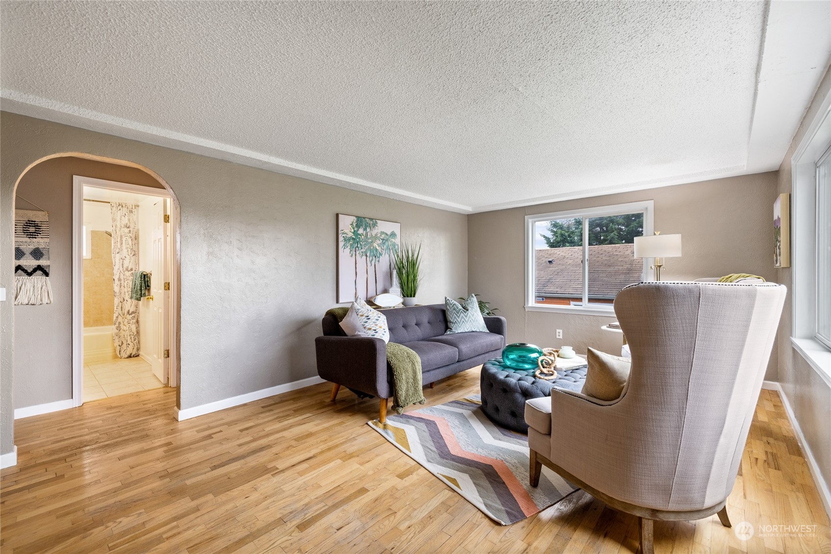 5037 South State Street Tacoma, WA 98409 - Photo 3 of 40 a living room with furniture rug and a window