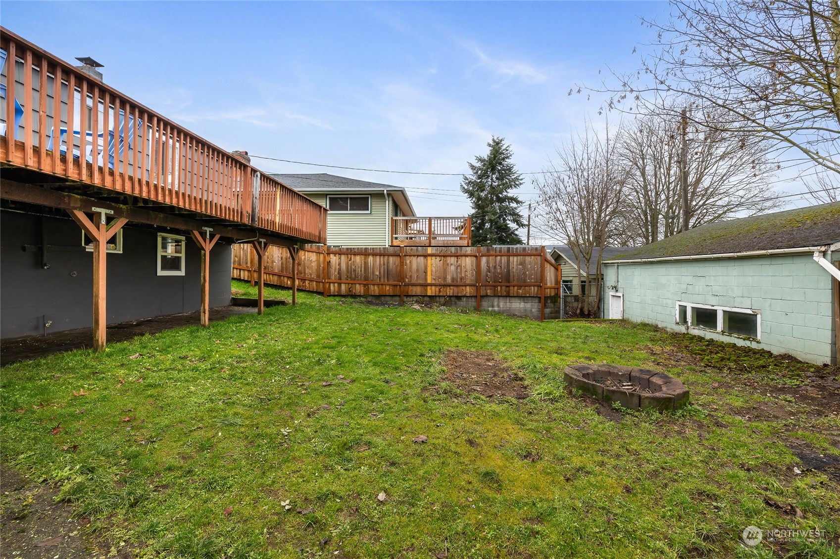 5037 South State Street Tacoma, WA 98409 - Photo 36 of 40 a view of a house with backyard and sitting area