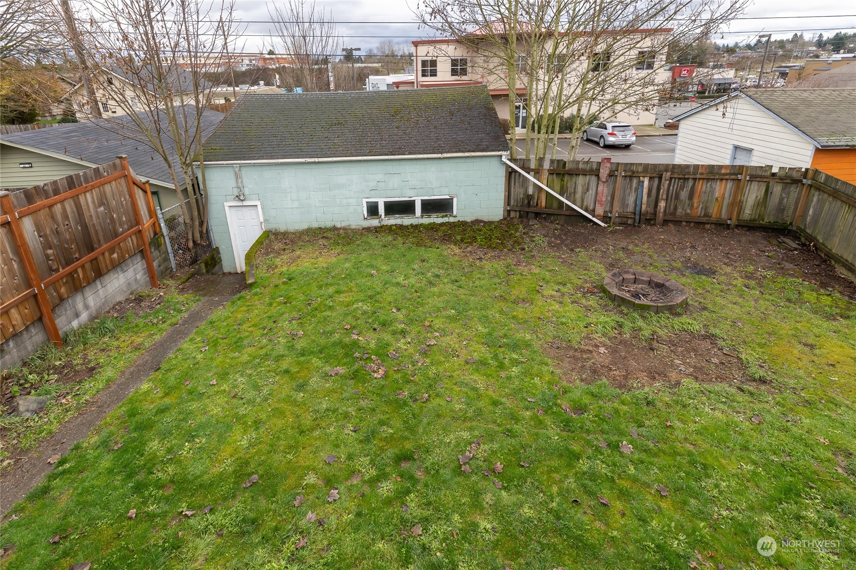 5037 South State Street Tacoma, WA 98409 - Photo 37 of 40 a view of a house with a yard