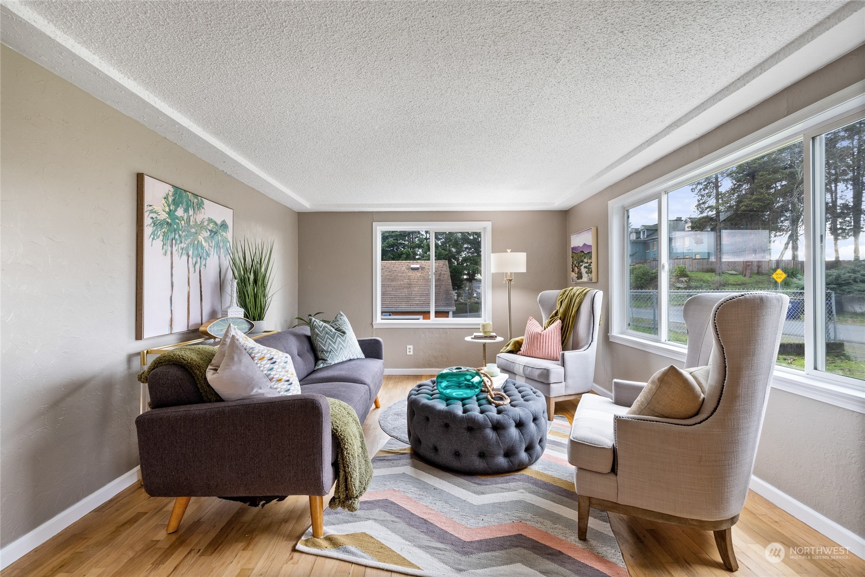 5037 South State Street Tacoma, WA 98409 - Photo 4 of 40 a living room with furniture and a large window