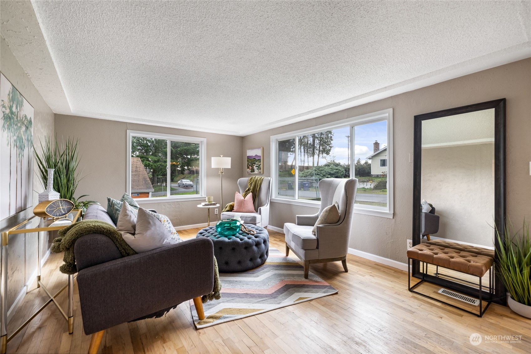 5037 South State Street Tacoma, WA 98409 - Photo 5 of 40 a living room with furniture and a window