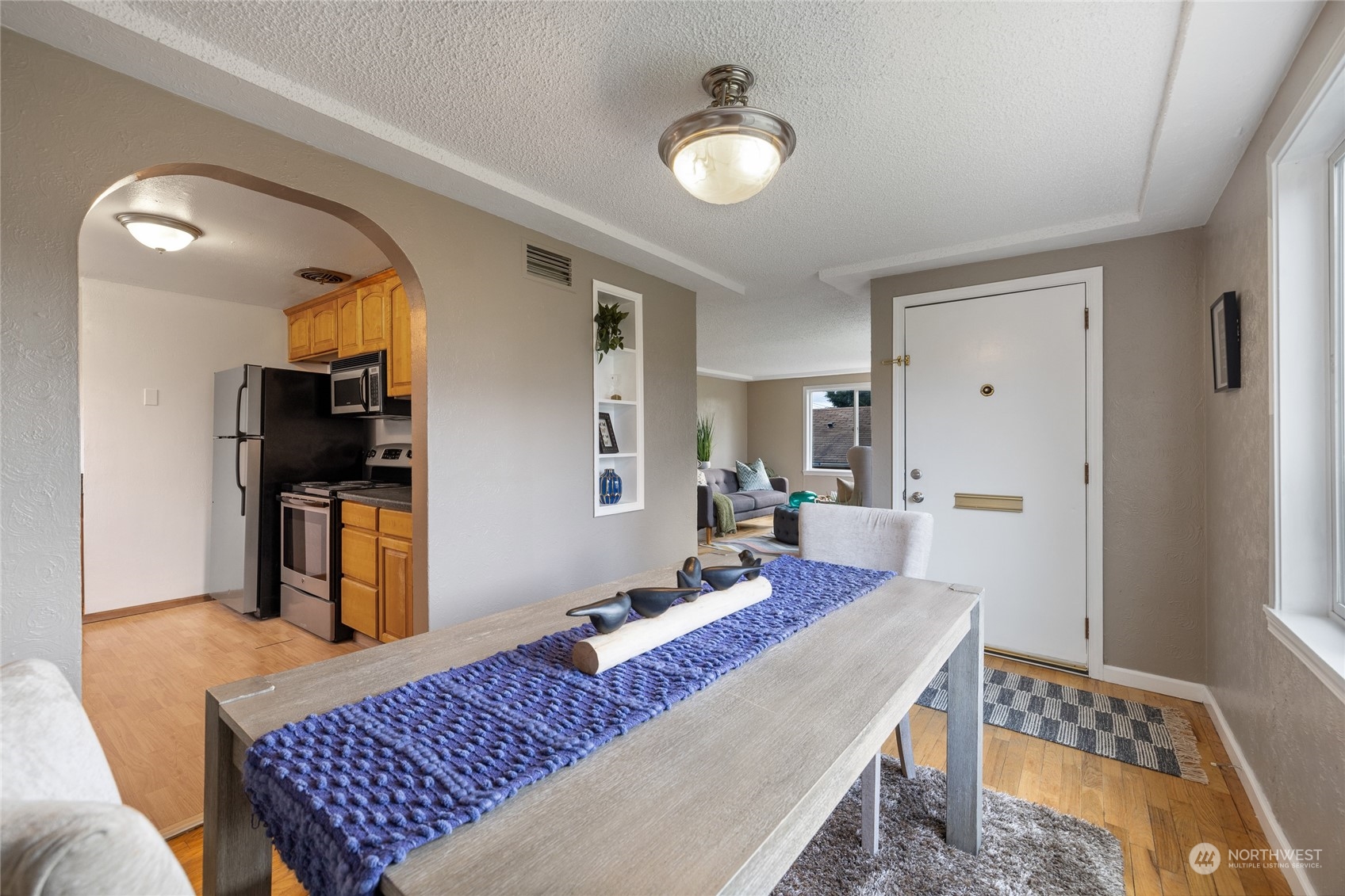 5037 South State Street Tacoma, WA 98409 - Photo 9 of 40 a bed room with a bed and furniture