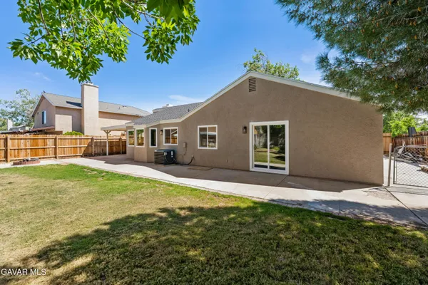 a house view with a garden space