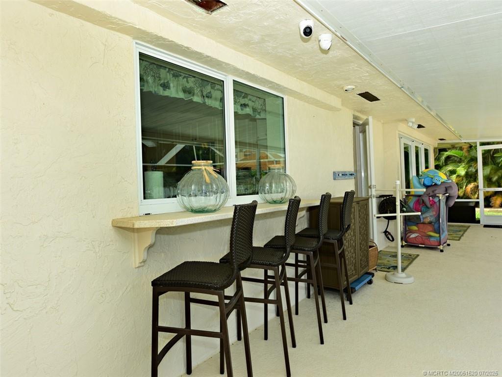 2645 Northwest S Shore Road Stuart, FL 34994 - Photo 34 of 51 a dining room with furniture and window