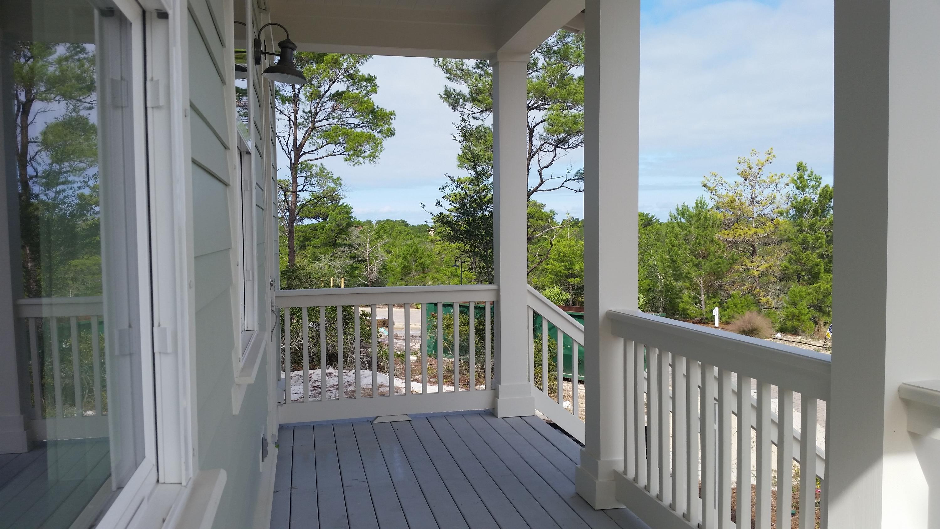 119 Gulfview Circle, Unit LOT 14 Santa Rosa Beach, FL 32459 - Photo 2 of 28 a view of a balcony with wooden floor