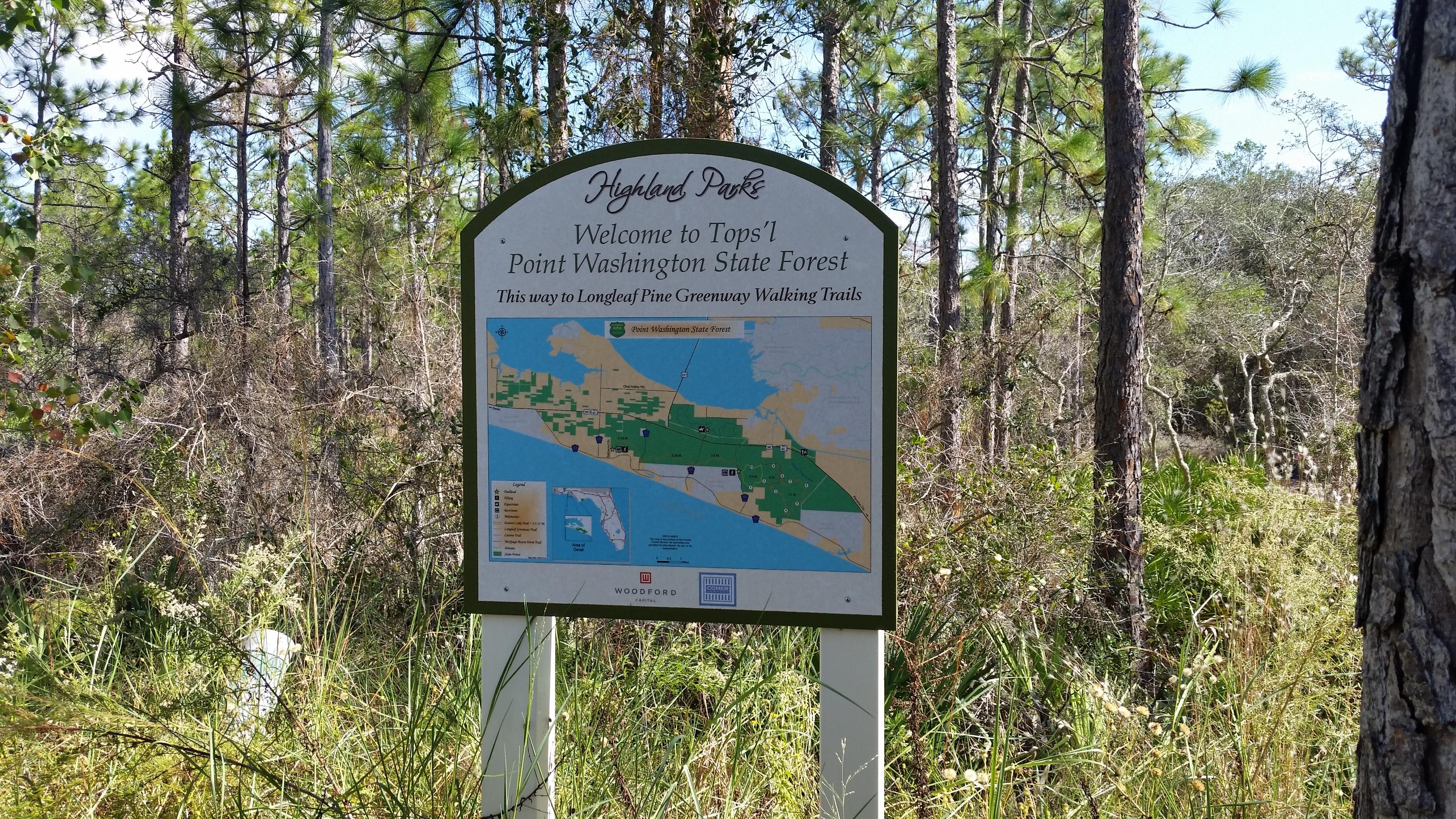119 Gulfview Circle, Unit LOT 14 Santa Rosa Beach, FL 32459 - Photo 26 of 28 a picture of a bench in front of a building