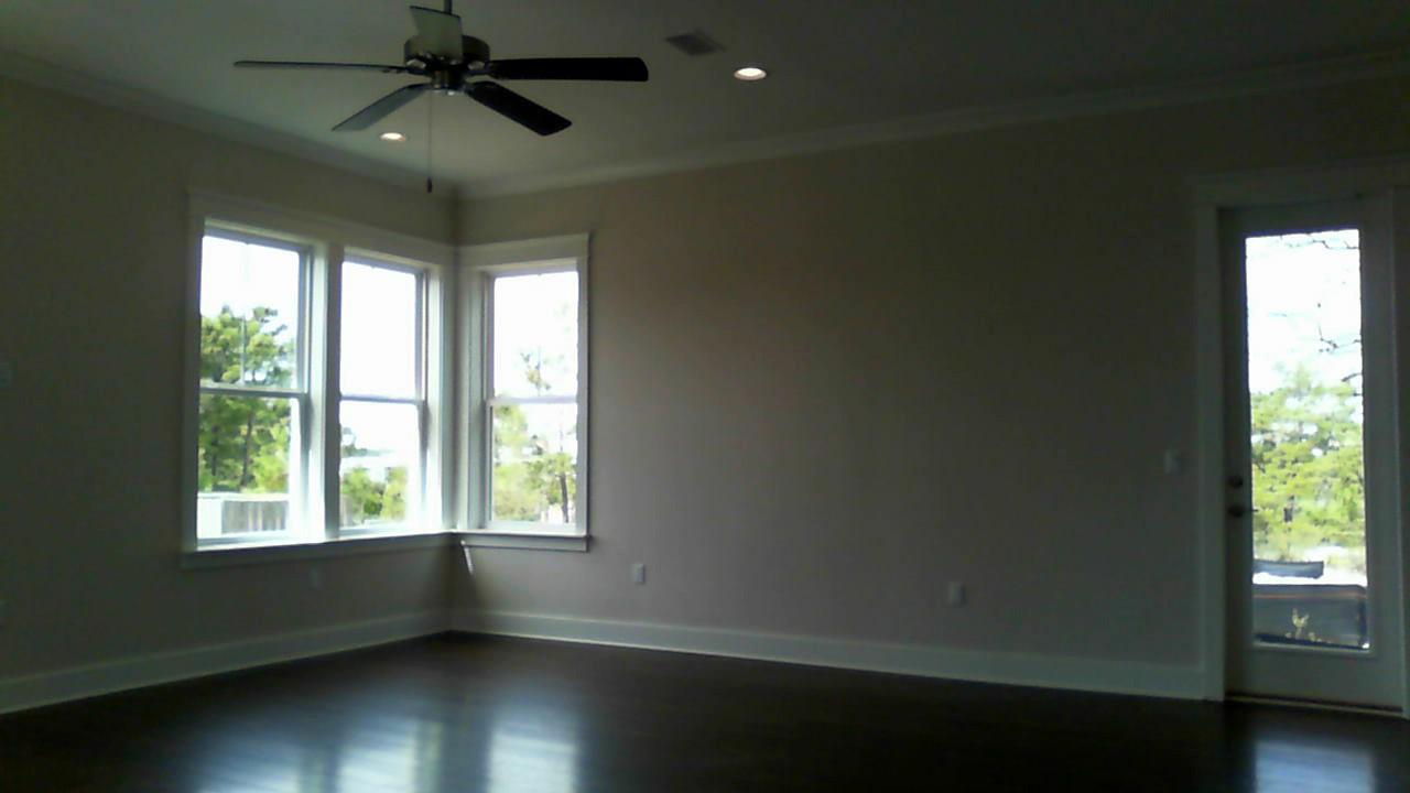 119 Gulfview Circle, Unit LOT 14 Santa Rosa Beach, FL 32459 - Photo 5 of 28 a view of an empty room with wooden floor and a window