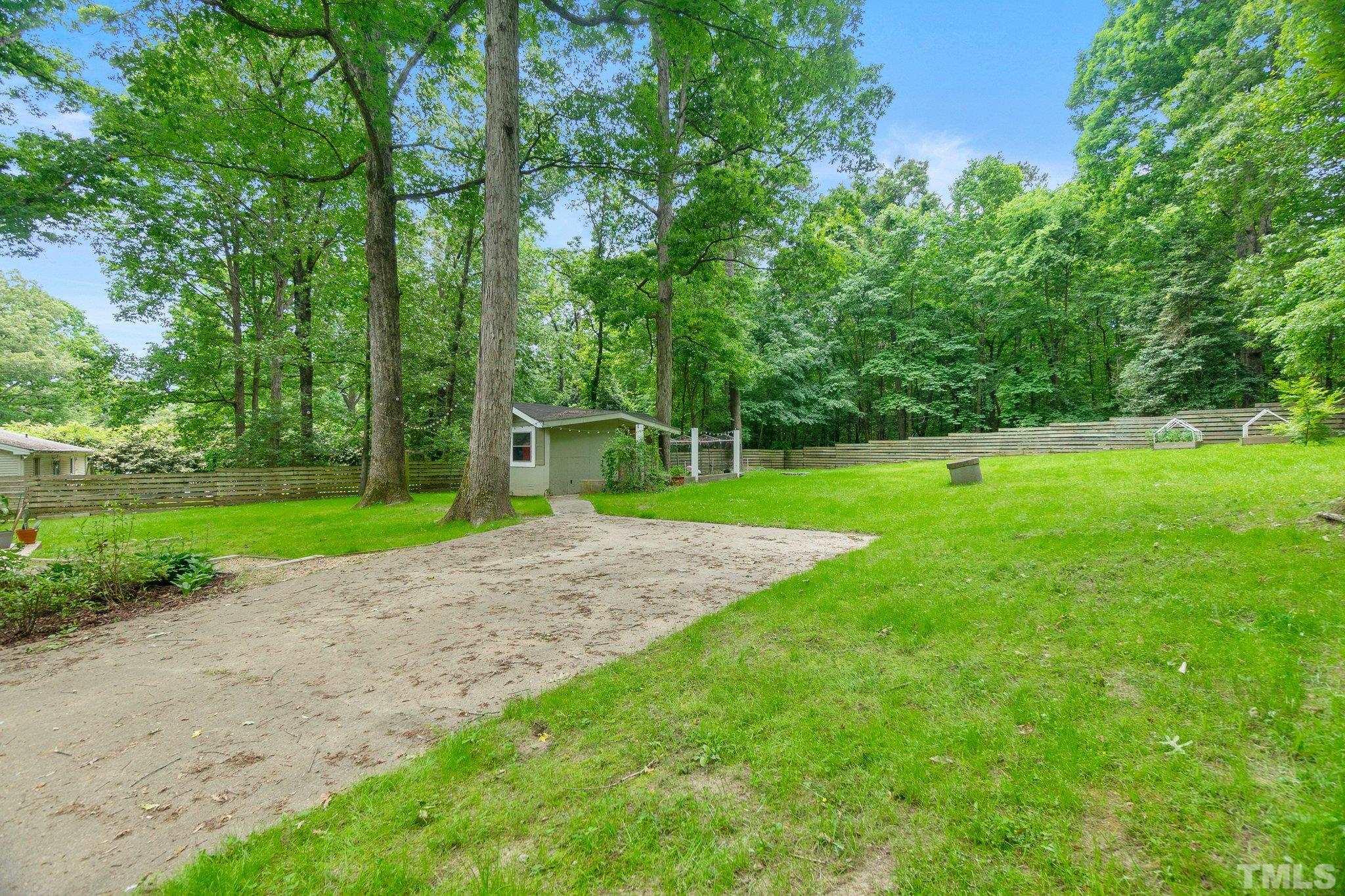 1200 Riverview Road Raleigh, NC 27610 - Photo 21 of 30 a view of a park with a large trees