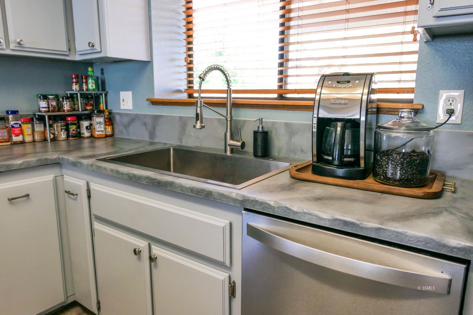 601 Heather Court Ridgecrest, CA 93555 - Photo 12 of 45 a kitchen with a sink and a window