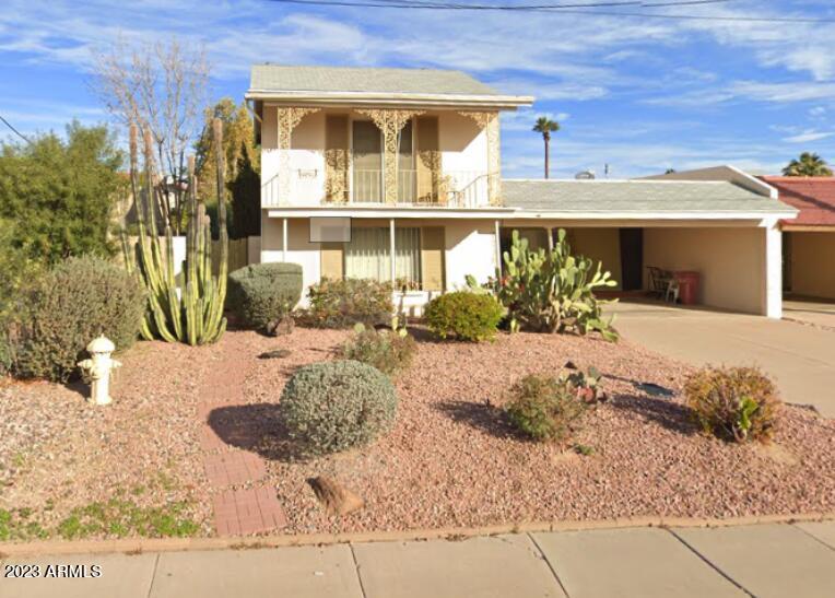 7738 East Chaparral Road Scottsdale, AZ 85250 - Photo 1 of 34 Front