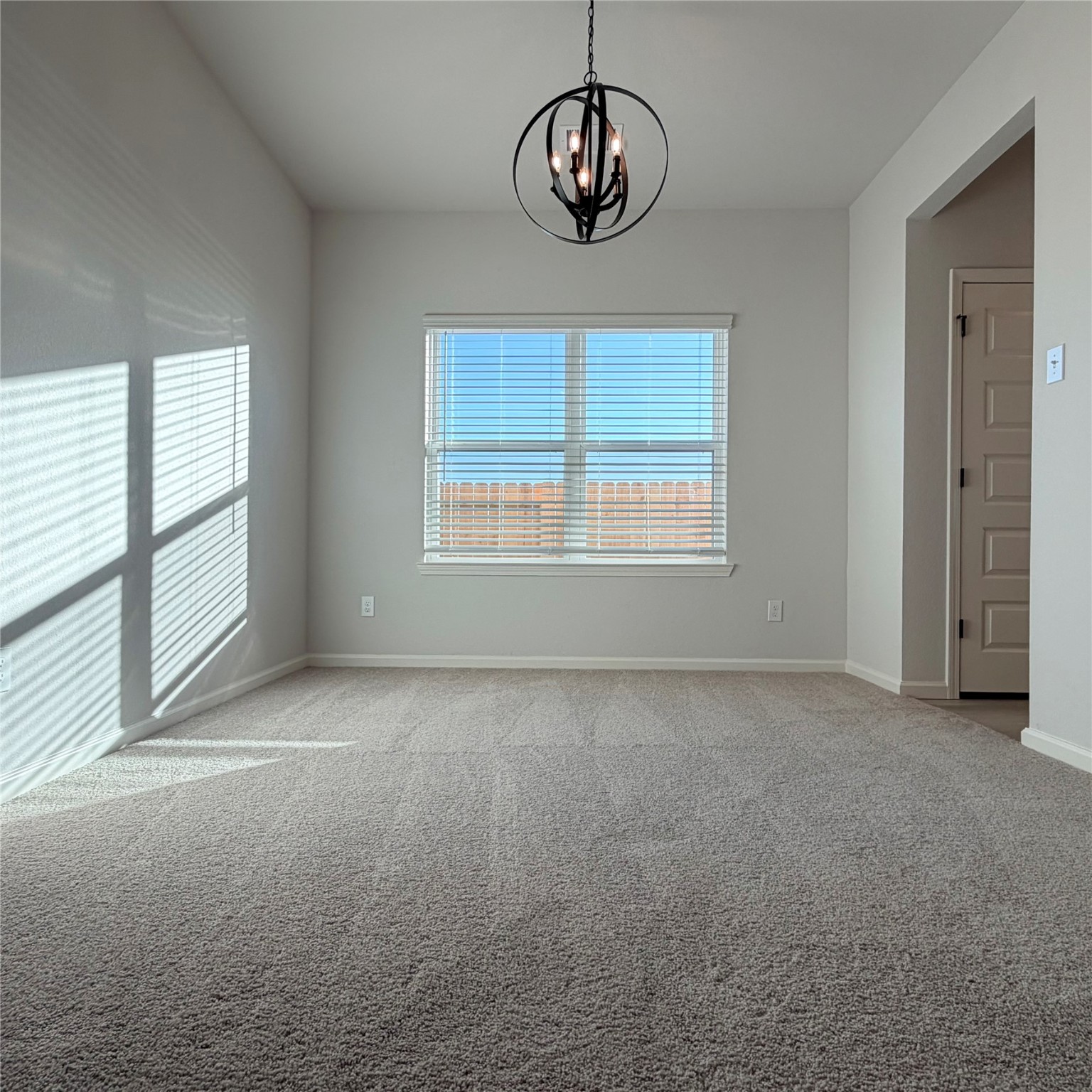 3418 Lago Norence Drive Manvel, TX 77578 - Photo 4 of 18 an empty room with a empty space and a window