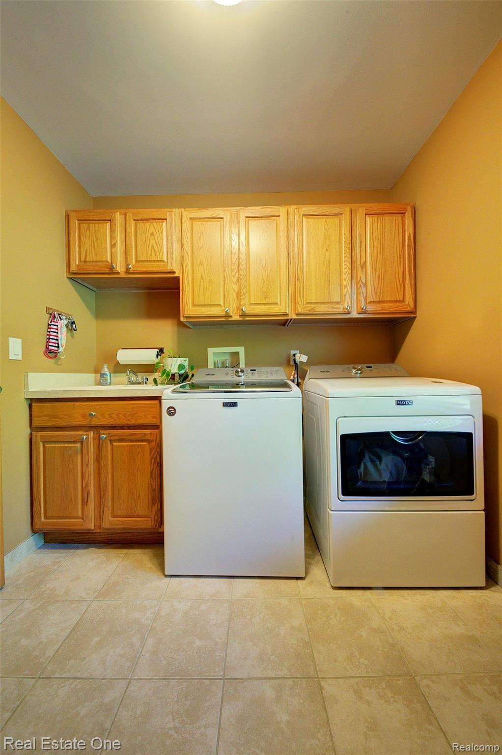 55001 Lee Road New Hudson, MI 48165 - Photo 28 of 51 First Floor Laundry/Mud Room