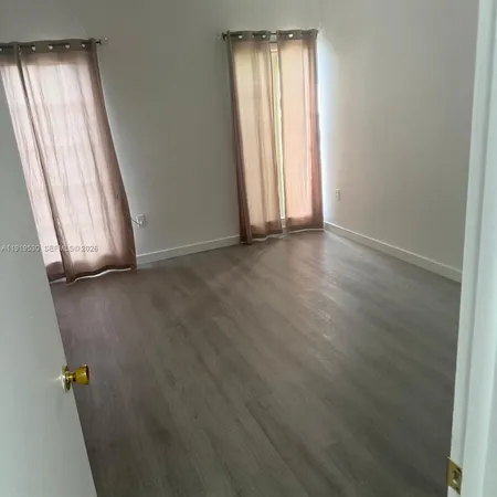 an empty room with window