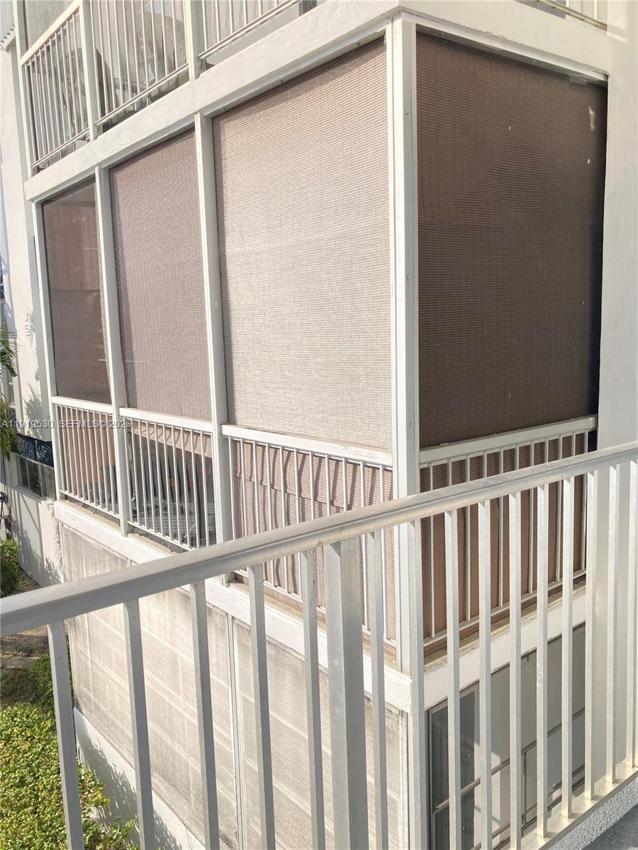 9159 Southwest 77th Avenue, Unit 211 Miami, FL 33156 - Photo 8 of 8 a view of a balcony