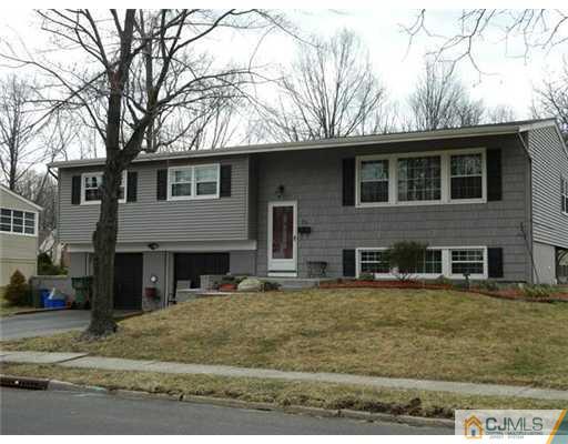 74 Harmon Road Edison, NJ 08837 - Photo 1 of 9 a view of a house with a yard