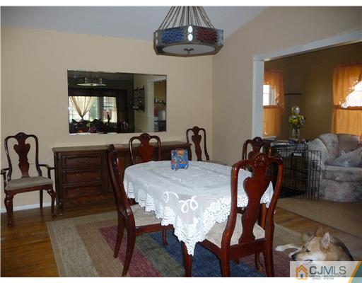 74 Harmon Road Edison, NJ 08837 - Photo 5 of 9 a view of a dining room with furniture