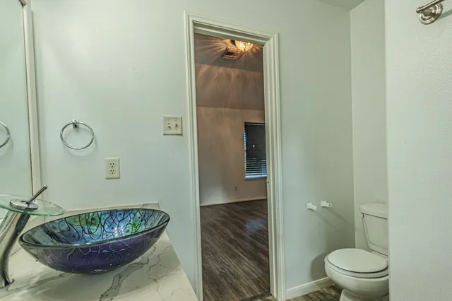 a view of a room with racks on the wall