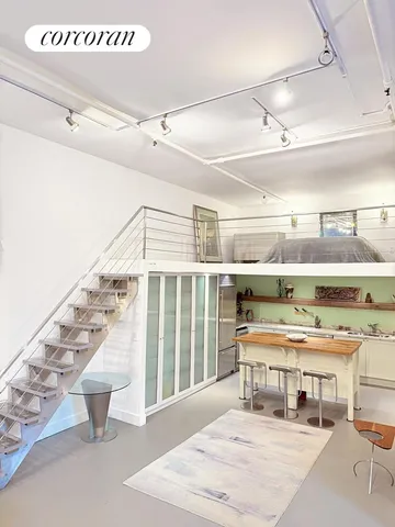 a room with lots of furniture and equipment