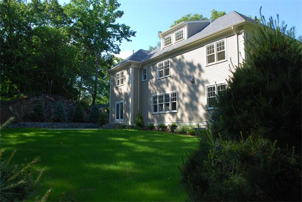 26 Tanglewood Road Wellesley, MA 02481 - Photo 15 of 16 a view of a house with backyard and garden