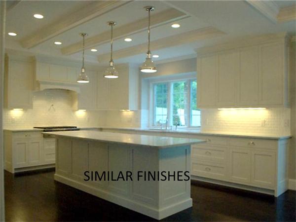 26 Tanglewood Road Wellesley, MA 02481 - Photo 9 of 16 a kitchen with kitchen island a stove and a window
