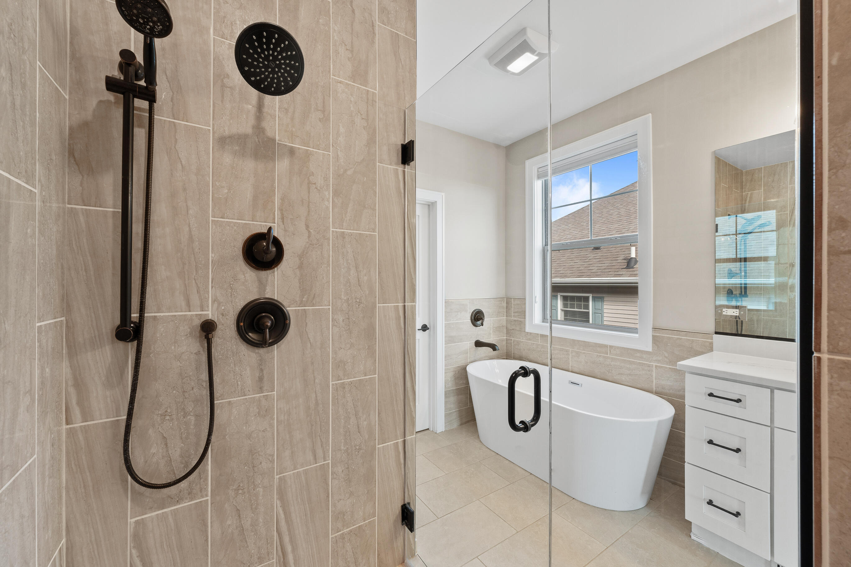 460 Stone Ridge Drive, Unit 480 Lake Geneva, WI 53147 - Photo 17 of 37 Luxurious master suite bathrooms with spa showers and large soaking tubs