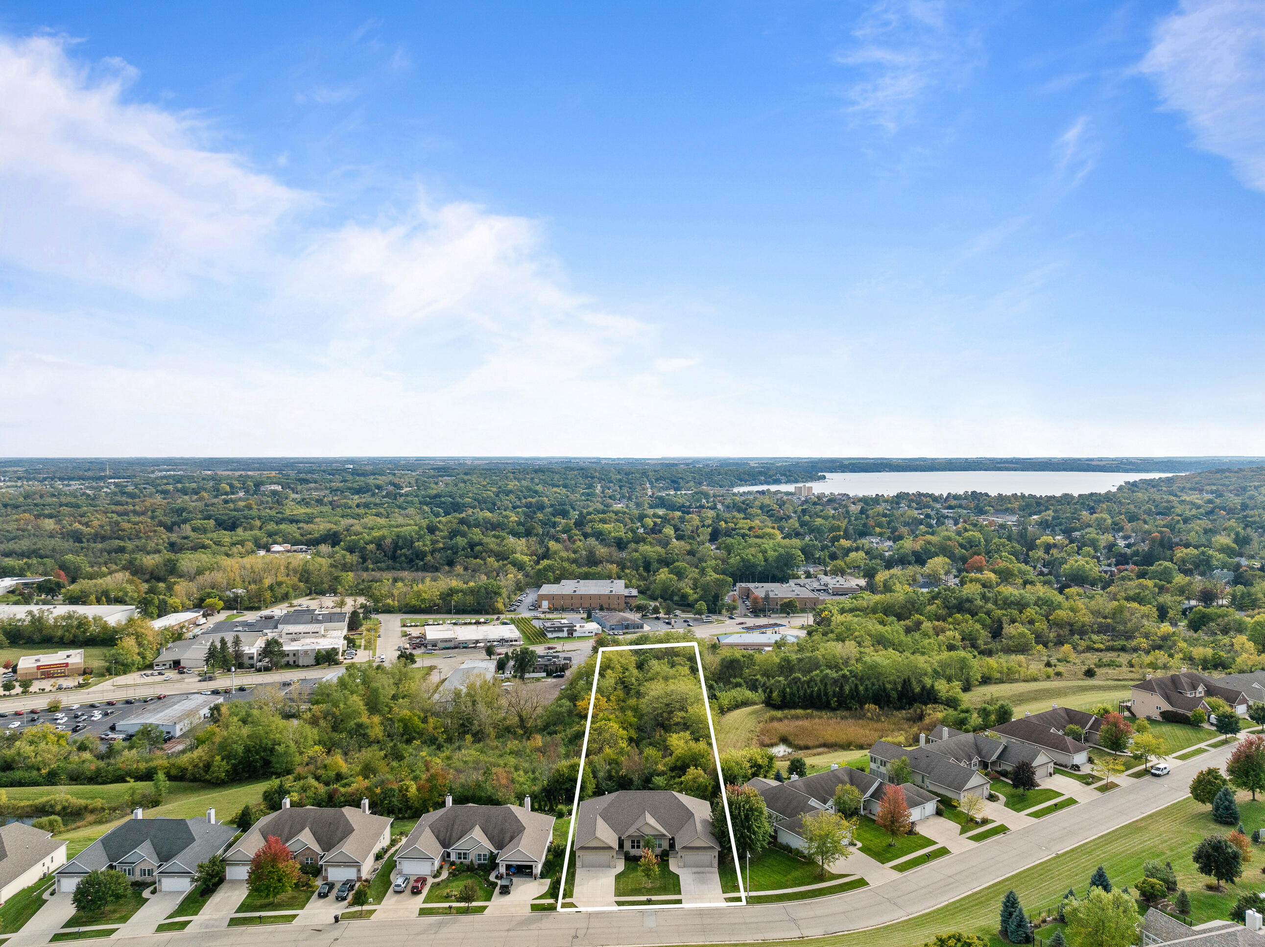 460 Stone Ridge Drive, Unit 480 Lake Geneva, WI 53147 - Photo 2 of 37 Aerial view of property, Lake Geneva to the south, walking distance to downtown