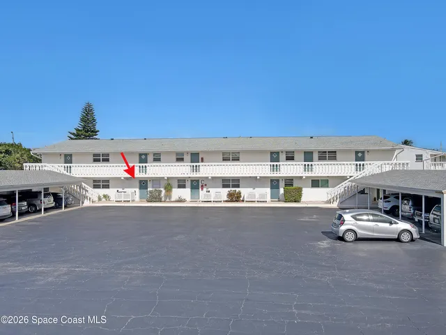 a view of swimming pool with outdoor seating and yard