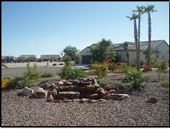 16551 West Berkeley Road, Unit 58 Goodyear, AZ 85395 - Photo 14 of 14 WATERFALL IN BACKYARD