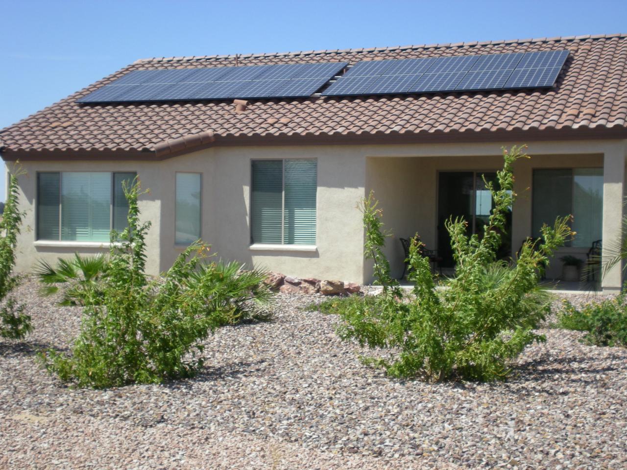 16551 West Berkeley Road, Unit 58 Goodyear, AZ 85395 - Photo 7 of 14 BACKYARD VIEW AND COVERED PATIO