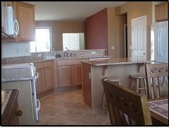 16551 West Berkeley Road, Unit 58 Goodyear, AZ 85395 - Photo 8 of 14 KITCHEN WITH CENTER ISLAND