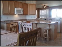 16551 West Berkeley Road, Unit 58 Goodyear, AZ 85395 - Photo 9 of 14 KITCHEN VIEW 2