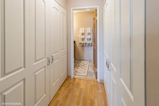 a view of a bathroom from a hallway
