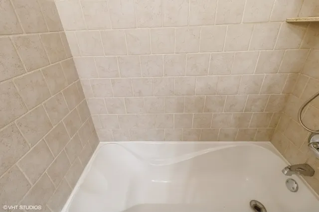 a bathroom with a bathtub