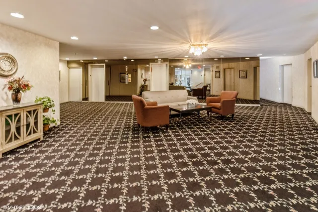 a living room with a couch and a table