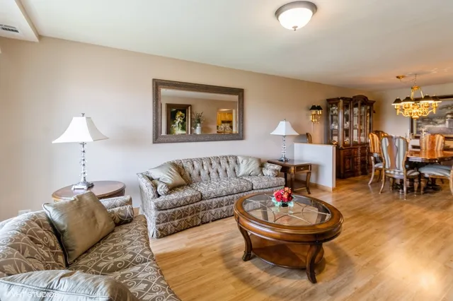 a living room with furniture and a table