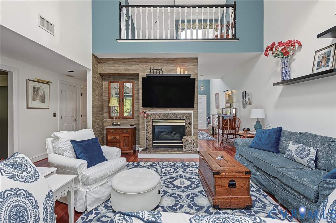 3131 Stony Point Road, Unit B Richmond, VA 23235 - Photo 20 of 65 Double-height ceiling, fireplace with stone surrou