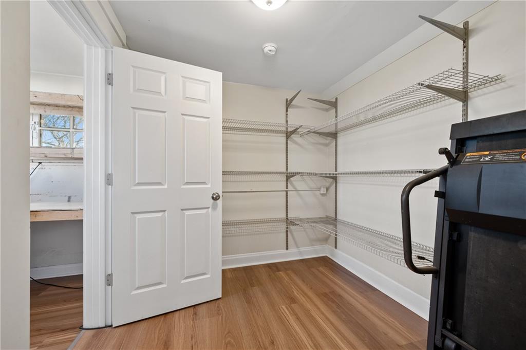 320 Newkirk Avenue Carnegie, PA 15106 - Photo 15 of 25 a view of walk in closet with wooden floor