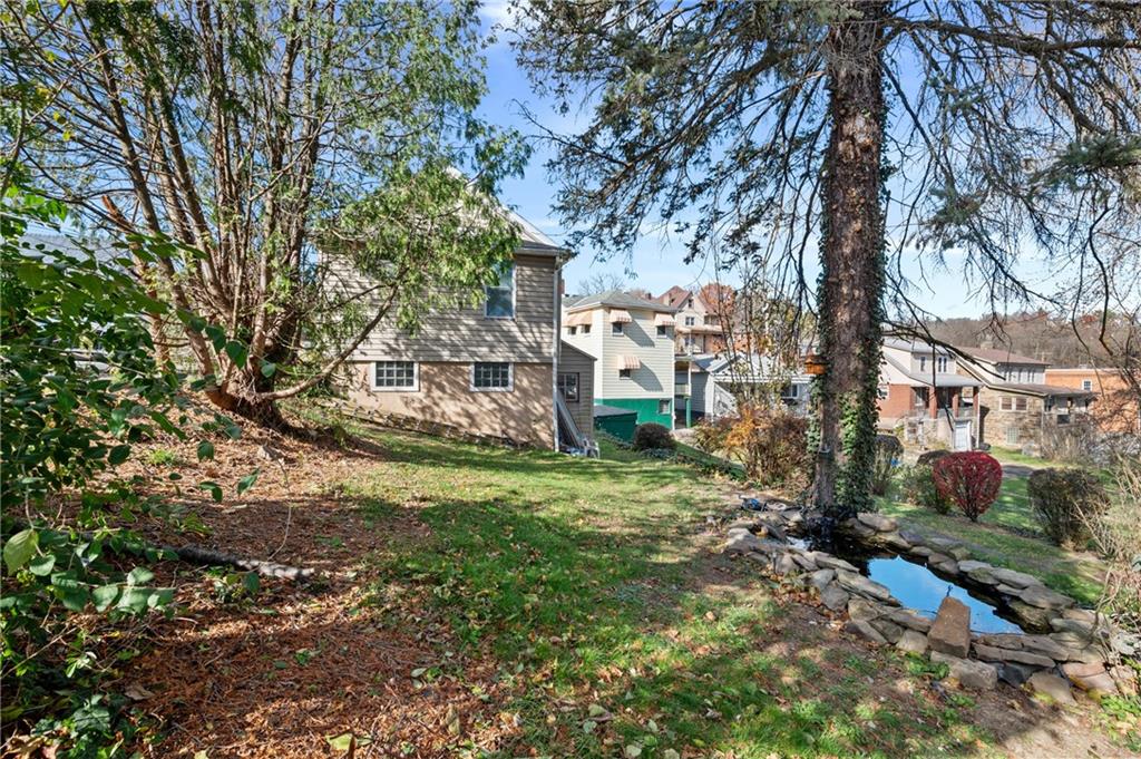 320 Newkirk Avenue Carnegie, PA 15106 - Photo 21 of 25 a view of a house with a yard