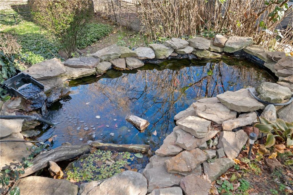 320 Newkirk Avenue Carnegie, PA 15106 - Photo 22 of 25 a view of a tree in front of a house
